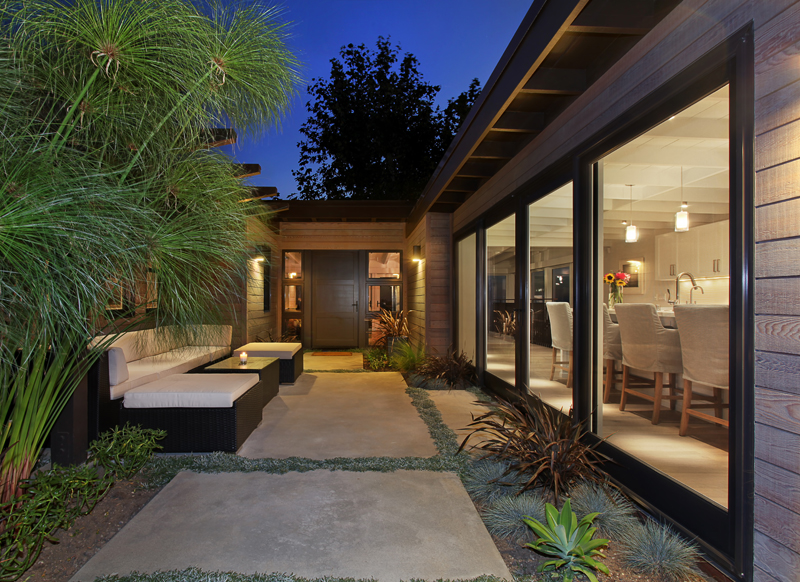 outdoor living space with windows and courtyard